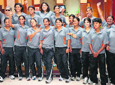 The Indian womens team pose for a photograph before leaving for the T20 World Cup in England at Bangalore.
