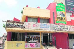 A cinema hall in Dehradun displays the poster of an old film