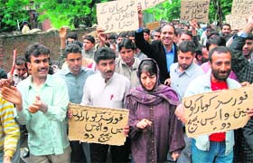 PDP chief Mehbooba Mufti along with party workers holds a protest in Srinagar