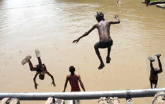 To get some relief from the blistering heat, boys dive into the Sirhind Canal in Bathinda.