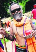 This sadhu is all smiles after his registration for the Amarnath yatra.