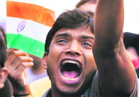 A protester shouts slogans in Sydney