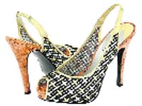 This geometrical printed peep-toe, stiletto looks cool on the shelf