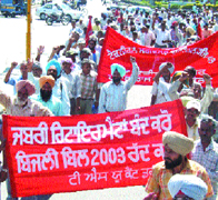 Members of the Technical Services Union take out a rally in Jalandhar on Tuesday.