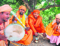 Sadhus sing hymns in Jammu.