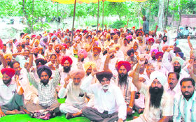 PSEB employees stage a dharna in Ludhiana on Tuesday.