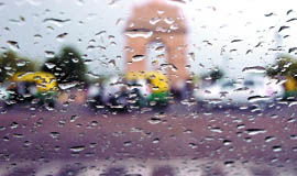 A scene at the India Gate during the sudden downpour in the afternoon in New Delhi on Wednesday.