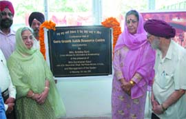 Gursharan Kaur, wife of Prime Minister Manmohan Singh with union minister of information and broadcasting Ambika Soni, inaugurates the conference hall of the upcoming Guru Granth Sahib Resource Centre in New Delhi