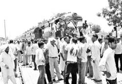 Residents of Chuliyana village block rail traffic in Rohtak