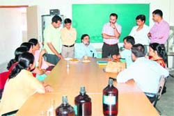 Members of a UGC team talk to CDLU faculty members in Sirsa.