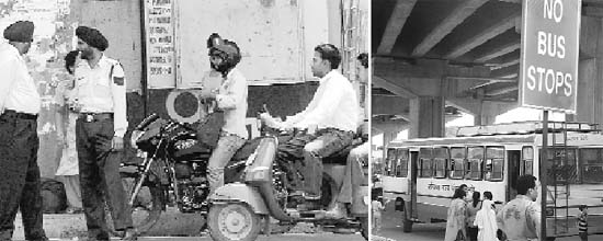 Traffic policemen look the other way as two-wheeler driver move without headgears; and (right) a Haryana roadways bus parked in no parking zone at Zirakpur