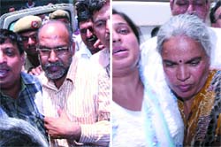 Accused Subhash Aggarwal (left) and wife Snehlata Aggarwal being produced in a court in New Delhi