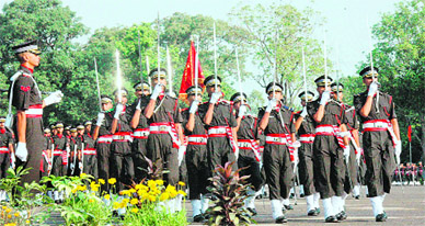 IMA cadets present guard of honour at the passing-out parade in Dehradun on Saturday.