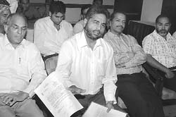 Tarsem Saini, president, Punjab Rice Millers Association, addresses a press conference in Jalandhar