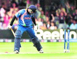 Yuvraj Singh is stumped by James Foster off the bowling of Graeme Swann at Lords on Sunday.