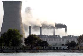 Smoke billowing from the chimneys of the GNDTP in Bathinda