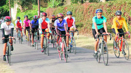 Cyclists take part in a practice session for Commonwealth Games in Patiala on Monday.