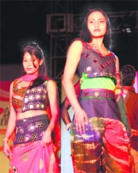 Models walk the ramp in stylish outfits designed by PIFT students at a fashion show organised by the institute at Lodhi Club in Ludhiana