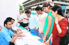 Students seek help at a party’s desk at the PU in Chandigarh.