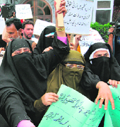 Jammu Kashmir Mass Movement activists protest over the Shopian incident in Srinagar on Wednesday.