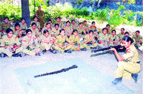 NCC cadets get training in the handling of arms at a camp at Kanya Maha Vidyalaya in Jalandhar.