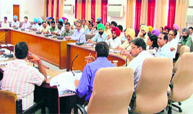 Officials of various departments at a meeting chaired by Deputy Commissioner in Ludhiana.