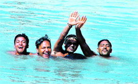 Youths take a dip in Sidhwan Canal to beat the heat in Ludhiana.
