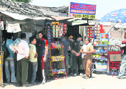 Shops outside the Bhagwati Nagar base camp do brisk business.