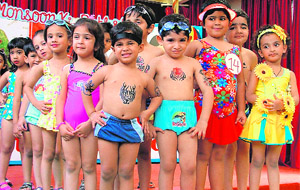 Tiny tots of Love Dale School at a modelling show on the school premises in Ludhiana on Friday.