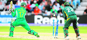 AB de Villiers is bowled by Shahid Afridi during their semifinal at Trent Bridge on Thursday.