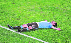 Italys Vincenzo Iaquinta lies on the pitch after failing to score against Egypt on Thursday in Johannesburg.
