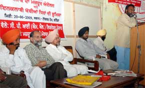 Representatives of trade unions addressing a convention on labour agitation in Bathinda on Saturday.