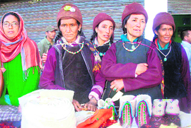 Zangskari women showcase woollen products in the fair in Leh on Saturday.