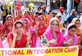 Students participating in the ongoing National Integration Camp in Bathinda, taking out a procession in the city on Monday.