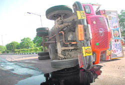 Traffic remained disrupted on the road separating Sectors 48 and 49 when a truck overturned after being hit by another truck in Chandigarh on Monday morning. It took hours for the police to clear the road. No one was reportedly injured in the accident.