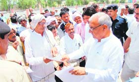 Chief Minister Bhupinder Singh Hooda listens to grievances in Rohtak