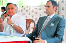 Union Forest and Environment Minister Jairam Ramesh stresses a point at a press conference in Srinagar on Monday as CM Omar Abdullah looks on.