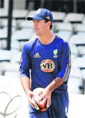 Ricky Ponting plays with a Rugby ball during a practice session in England on Monday. 