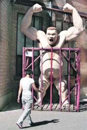 ARTS SAKE: A woman walks past a sculpture at Beijings 798 art zone on Monday