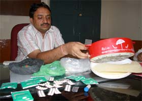 J.K. Garg, superintendent, Bathinda Central Jail, showing the intoxicating and drugs recovered from two prisoners