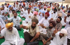 In a protest against the assault on a tehsildar at Ludhiana, officials of the Revenue Department staging a demonstration in Bathinda