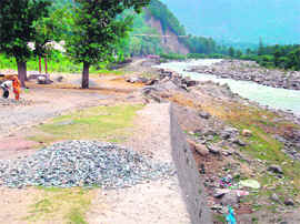 The damaged portion of the National Highway at Raison.