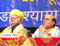 BJP chief Rajnath Singh (right) with RSS president Mohan Rao Bhagwat at a seminar on national integration in Jammu on Tuesday. 