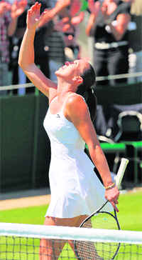 Jelena Jankovic gestures after winning her match against  Julia Goerges 6-4 7-6 on Tuesday.