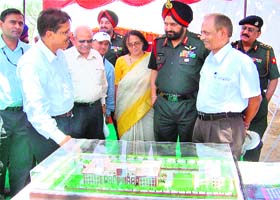 DRDO Chief Controller W Selvamurthy (right) is briefed about the building plans for a new bio-technology laboratory in Chandigarh