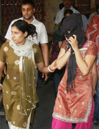 The Gurgaon police on Wednesday arrested six girls on charges of immoral trafficking near Manesar. 