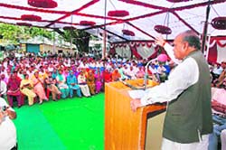 Chief Minister Prem Kumar Dhumal addressing a public meeting at Sujanpur on Wednesday.