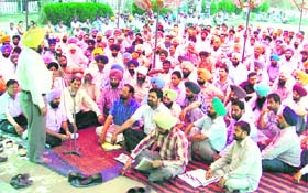 Revenue officials protesting outside the deputy commissioner office as the strike entered the third day
