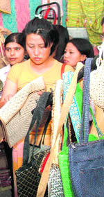 A Bhutanese woman at a handloom emporium in Dehradun on Thursday
