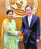 Minister of State for External Affairs Preneet Kaur shakes hands with UN Secretary-General Ban Ki-Moon at the UN Headquarters in New York on Wednesday.